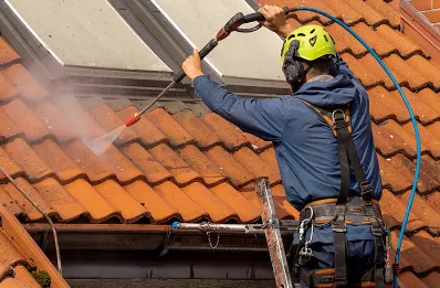 Démoussage et hydrofuge de toiture à Andert-et-Condon